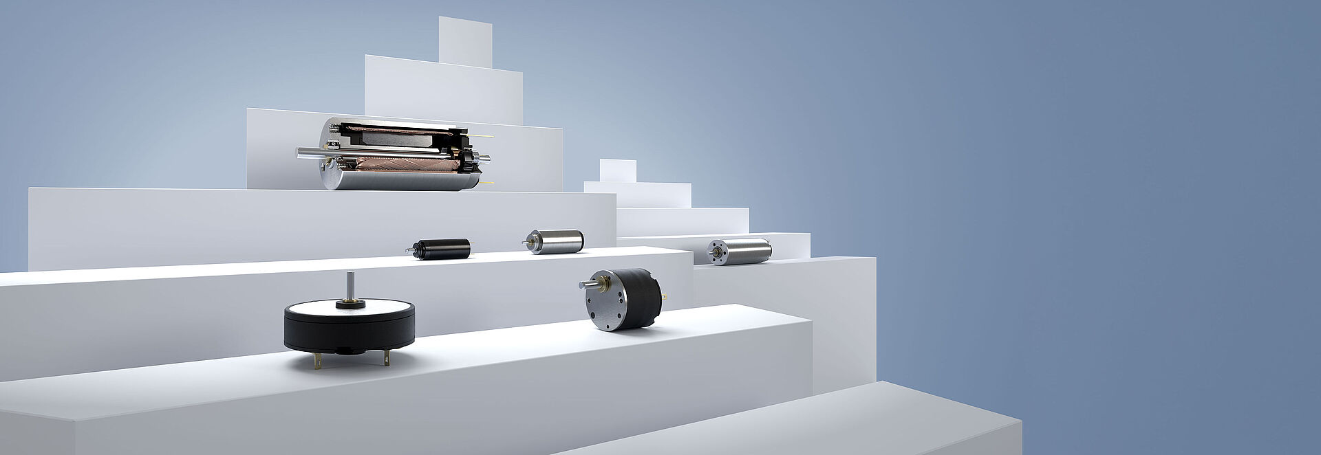 Six different DC-motors from FAULHABER, arranged on white stages against a gray-blue background.
