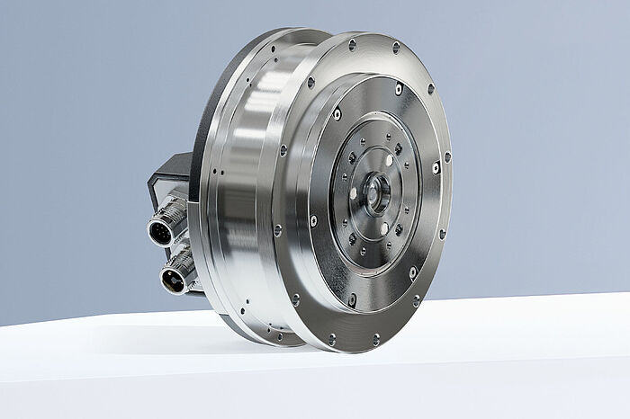 The FAULHABER BXI was developed specifically for the high demands placed on joints in current and future robotics applications. A brushless flat motor 9317 ... BXI G from FAULHABER sitting on white steps against a gray-blue background.