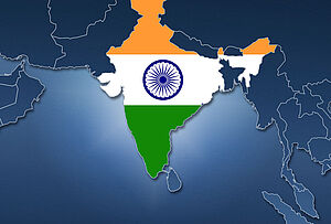 蓝色调的非洲和亚洲示意图，带有国家边界，其中印度区域用印度国旗填充。该地图象征着 FAULHABER India Pvt Ltd. 网站的开通。