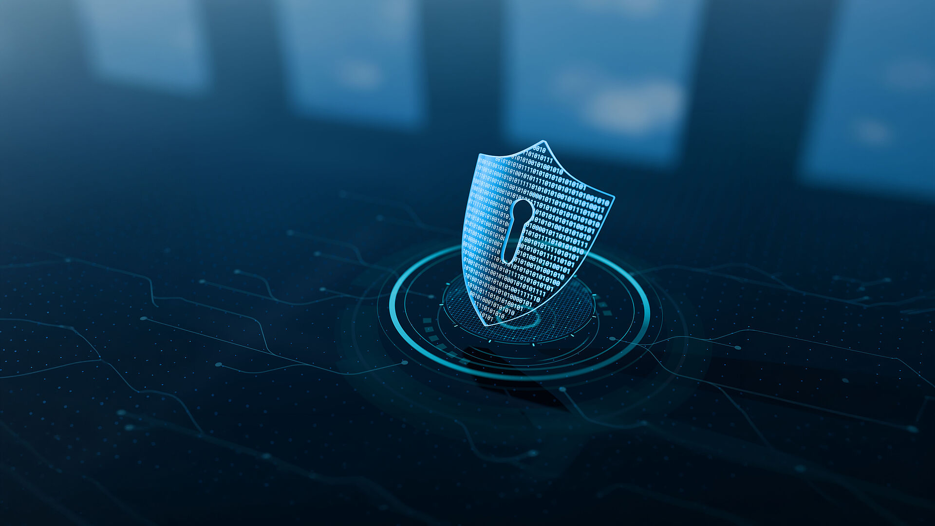 Digitally rendered shield with a keyhole and binary code on a connected technology interface. The graphic symbolizes cyber security and information security.