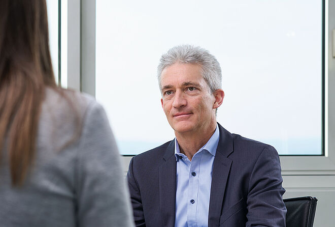 Closeup portrait of FAULHABER Managing Director Dr. Udo Haberland in an interview